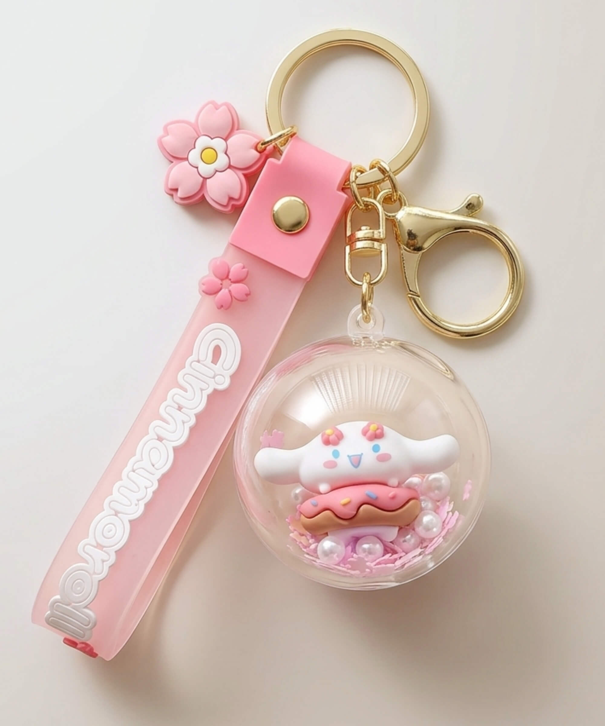 Cinnamoroll donut shaker keychain with floating beads inside clear charm
